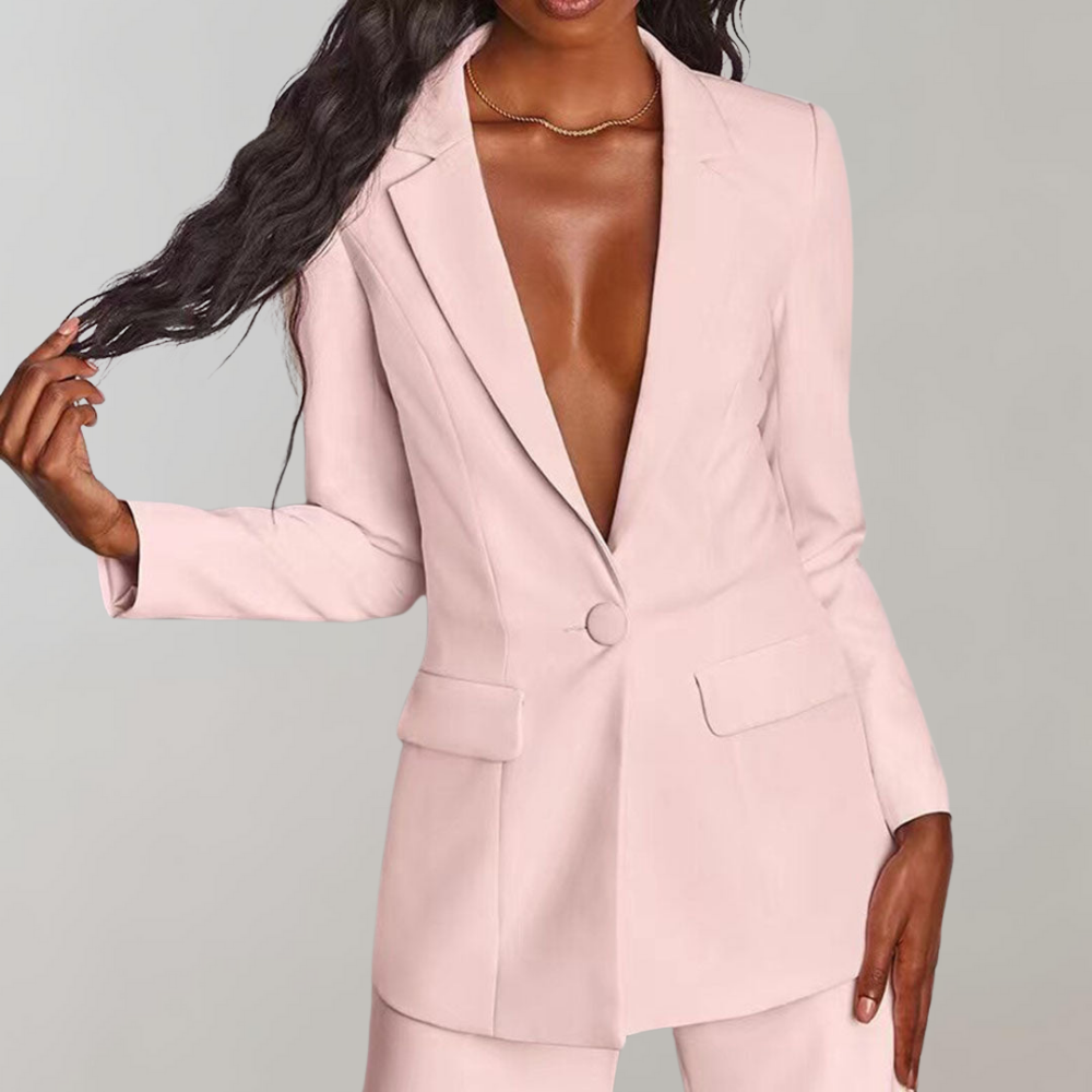 Tidlöst damset med blazer och byxor, ett elegant modeval för arbete och fest, året runt.
