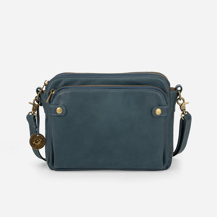 Elegant damläderväska crossbody med multifunktionell design, justerbara remmar och RFID-skydd i flera färger.