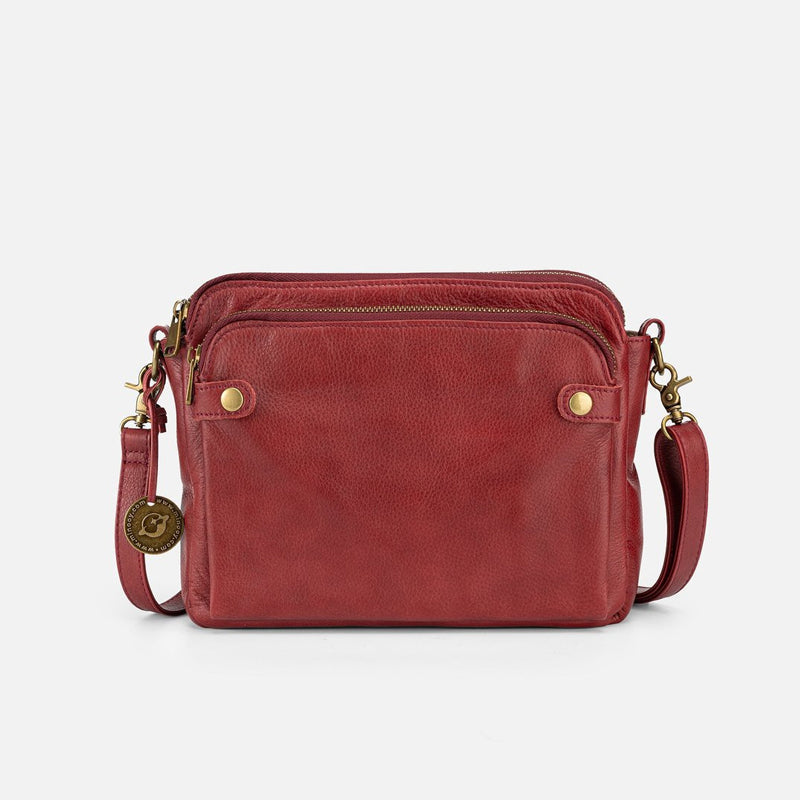 Elegant damläderväska crossbody med multifunktionell design, justerbara remmar och RFID-skydd i flera färger.