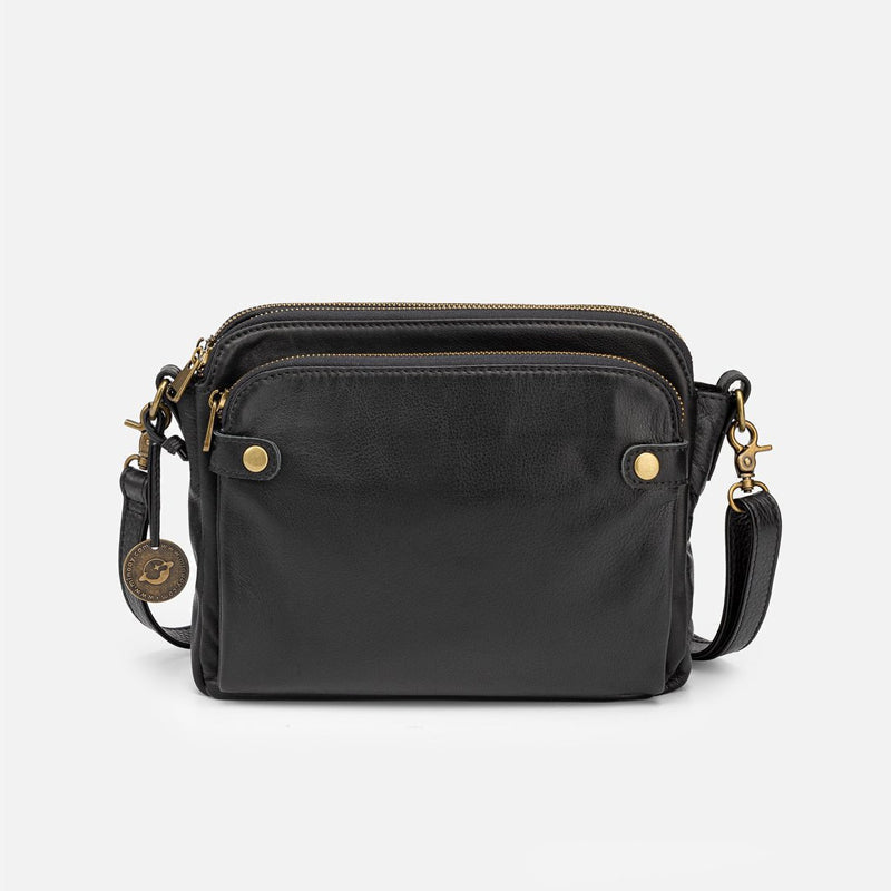 Elegant damläderväska crossbody med multifunktionell design, justerbara remmar och RFID-skydd i flera färger.