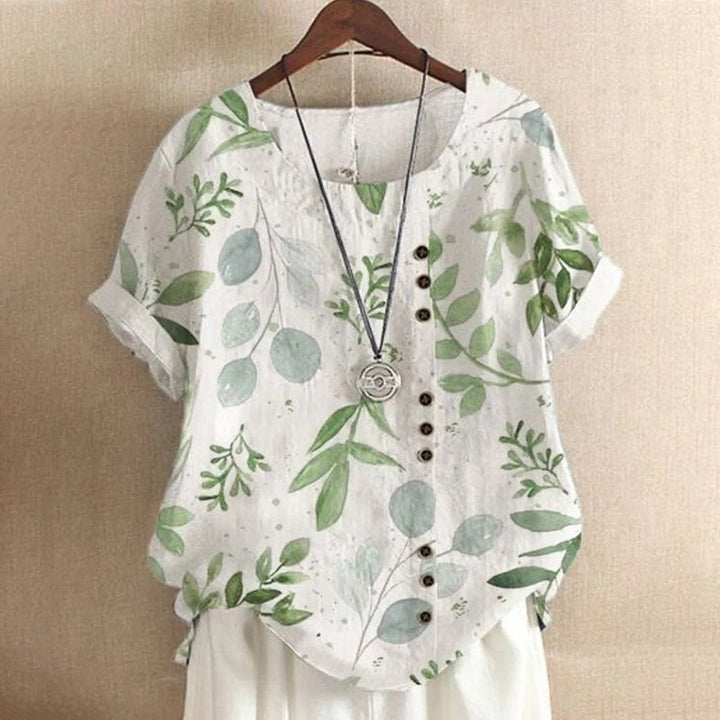 "Elegant damlinne i bomull och linne med chic modetryck, perfekt för varma dagar och en stilren look."
