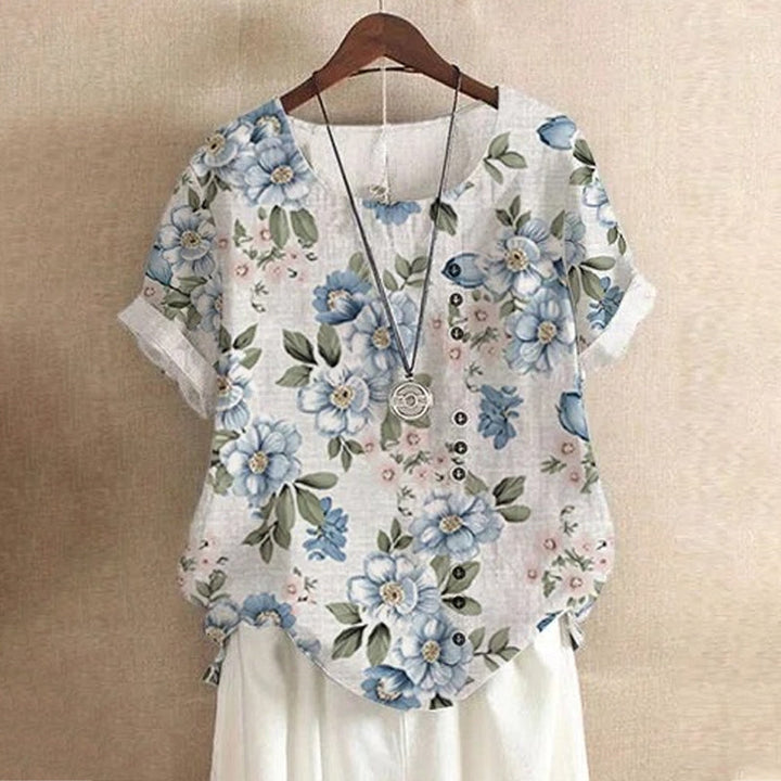 "Elegant damlinne i bomull och linne med chic modetryck, perfekt för varma dagar och en stilren look."