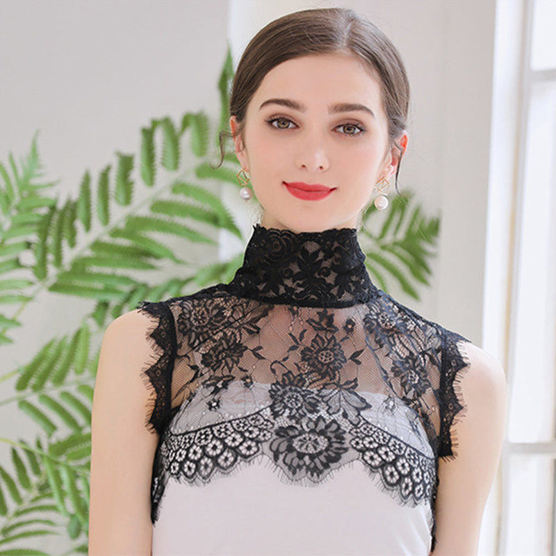 "Elegant damspets falsk krage i svart, detaljerad med spets, för en stilren och sofistikerad look som lyfter din outfit."