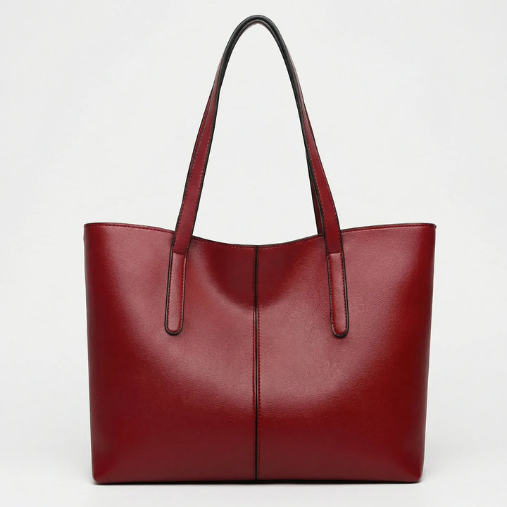 Elegant totebag Jessy, rymlig och tidlös. Perfekt axelväska för organiserad vardag och arbete.