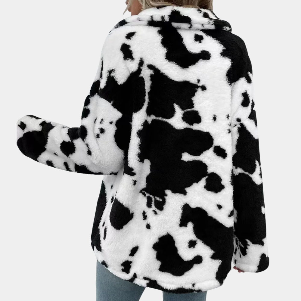 Brun damjacka med fuskpäls, varmt och bekvämt ytterplagg. Perfekt för kyligt väder, stilren look.
