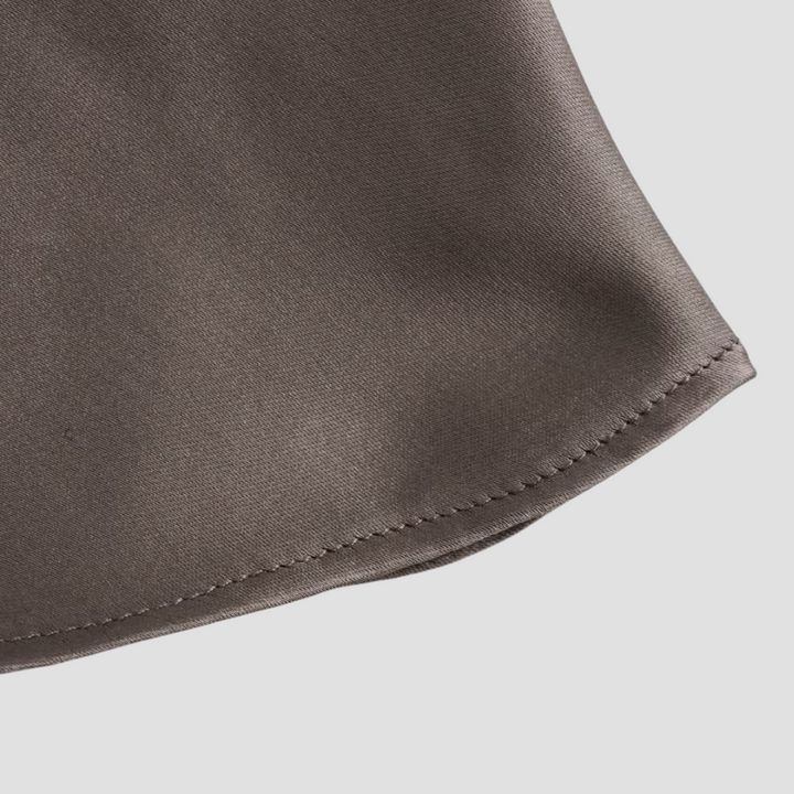 Draperad halterneck tanktopp i beige, bekväm och chic för varma sommardagar.