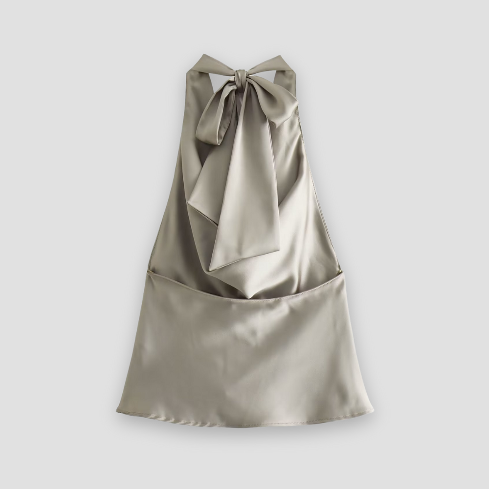 Kvinnors draperade halternecklinne i brun ton, en trendig sommartopp.