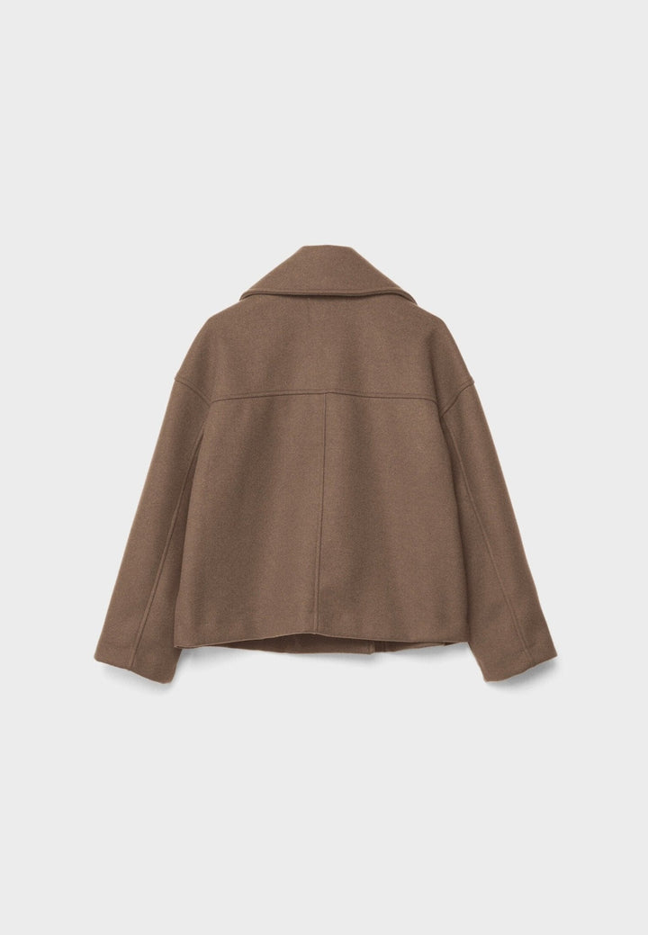 Kort damjacka, dubbelknäppt design. Stilren höstjacka, perfekt för vardagsbruk som modejacka.