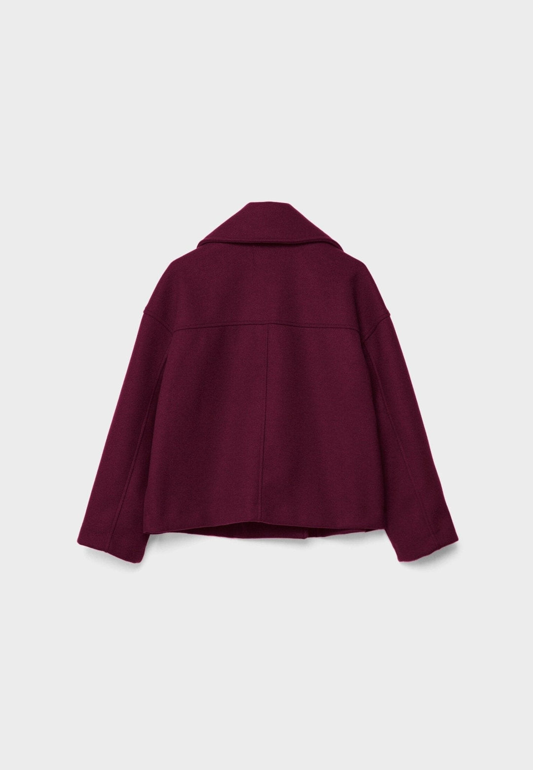 Höstjacka för dam, dubbelknäppt och kort modell. Ett elegant ytterplagg för svalare dagar.