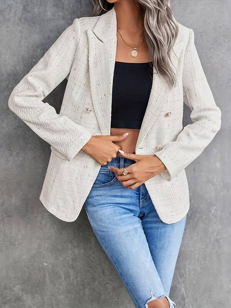 Formell arbetskläder: Kvinnors dubbelknäppta kavaj, perfekt för en chic och sofistikerad look på kontoret.