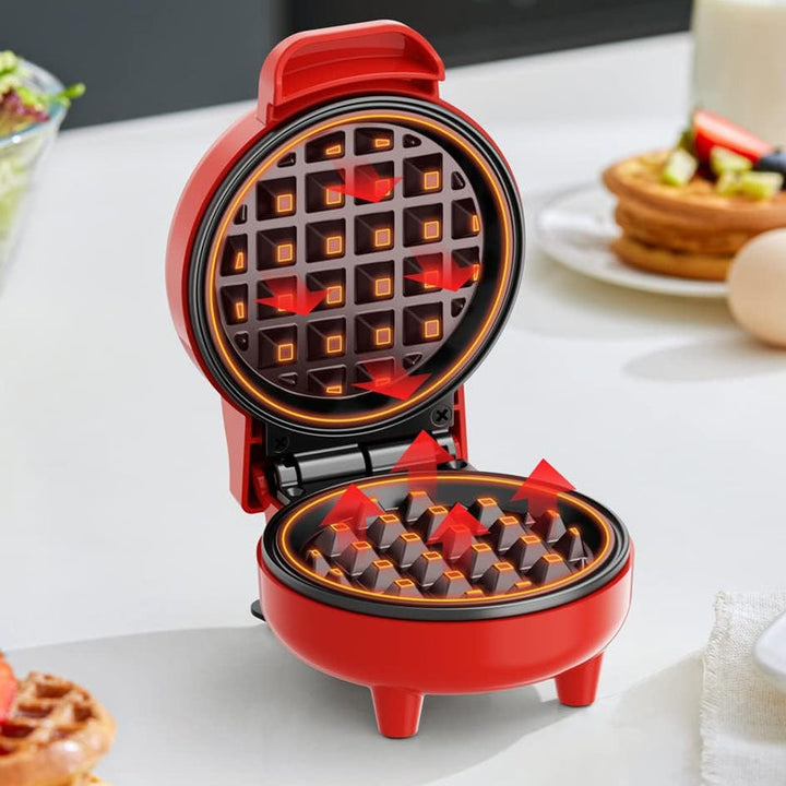 "Elegant elektrisk kompakt våffelmaker med non-stick beläggning, perfekt för små kök och resor."