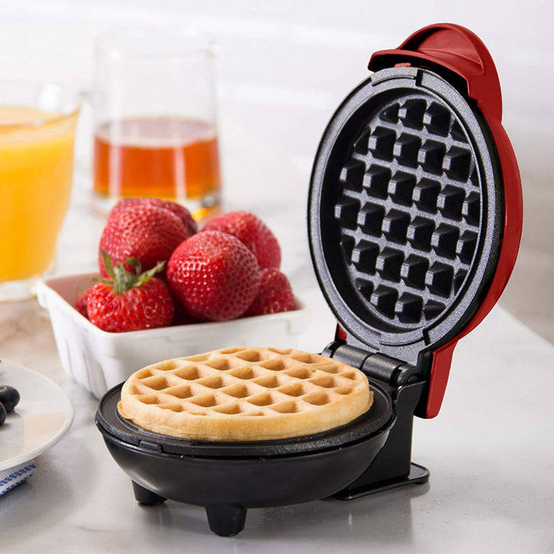 "Elegant elektrisk kompakt våffelmaker med non-stick beläggning, perfekt för små kök och resor."