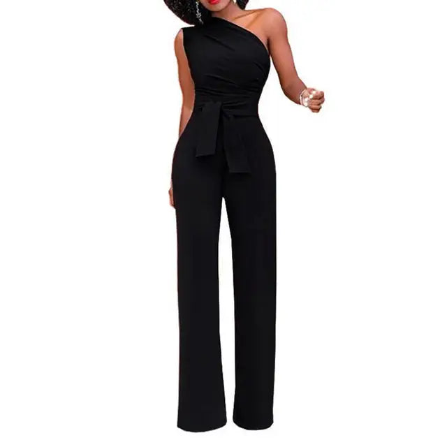 Damjumpsuit Phoebe med en axel, knytmidja och vida ben, en modern och festlig stil.