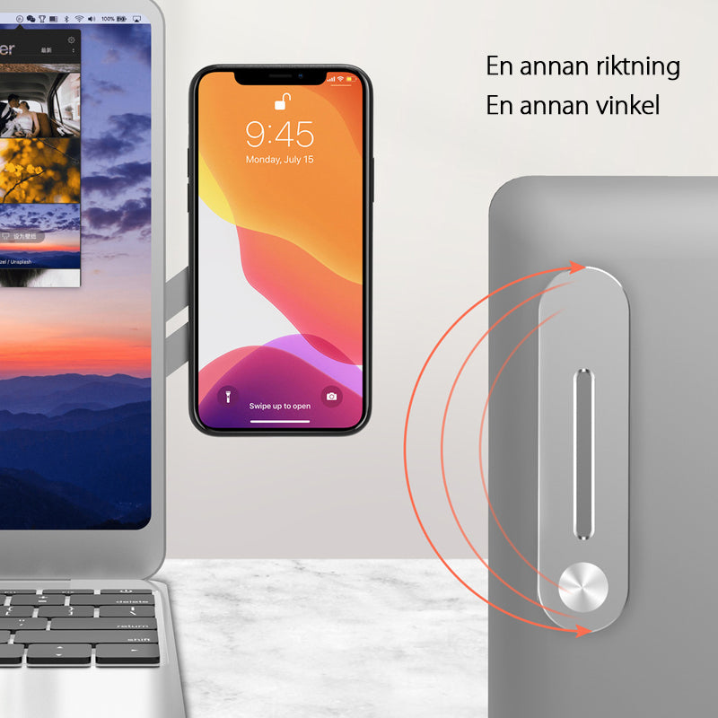 "Elegant expansionsfäste i silver för bärbar dator, aluminium, flexibel design, optimerar arbetsyta, lätt installation."