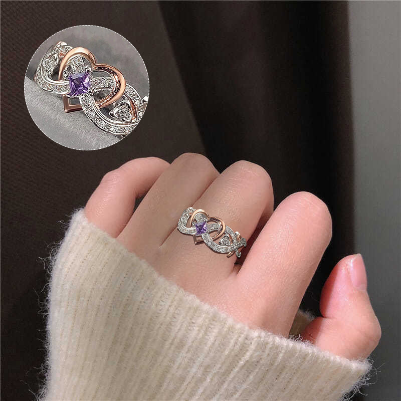 "Elegant februari ametyst ring i silver för kvinnor, handgjord, detaljrik design med hjärta och oändlighetsband."