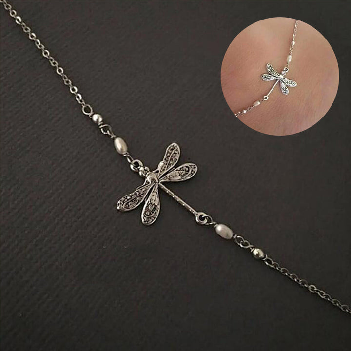 "Elegant fotkedja i sterling silver med glittrande trollslända, justerbar kedja, passar perfekt till alla damaccessoarer."