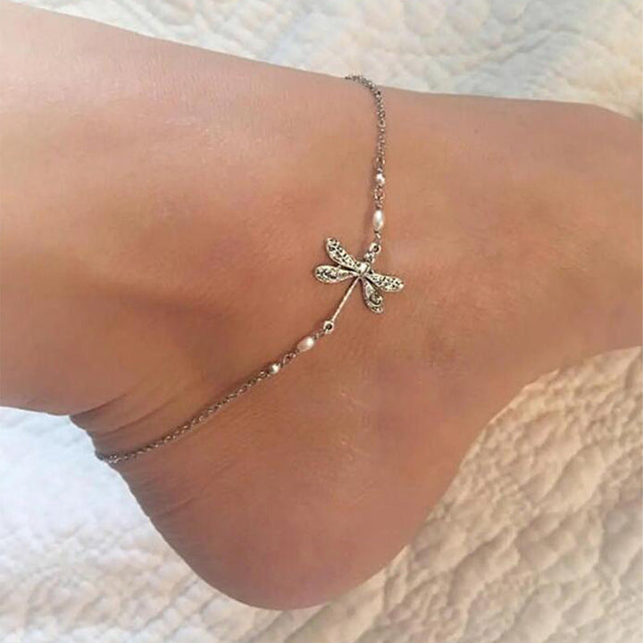 "Elegant fotkedja i sterling silver med glittrande trollslända, justerbar kedja, passar perfekt till alla damaccessoarer."