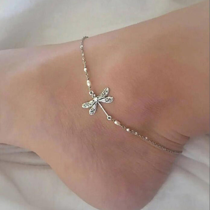 "Elegant fotkedja i sterling silver med glittrande trollslända, justerbar kedja, passar perfekt till alla damaccessoarer."