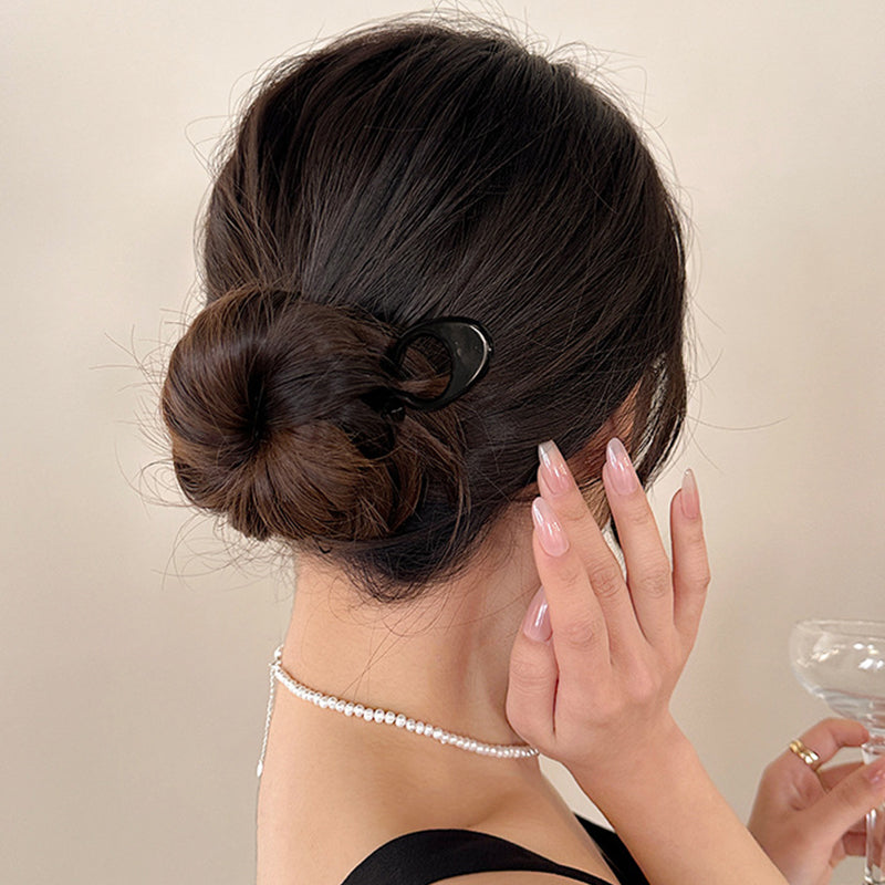 "Elegant fransk hårnål i mångfärgad design för stilfull hårstyling; perfekt damaccessoar för alla tillfällen."