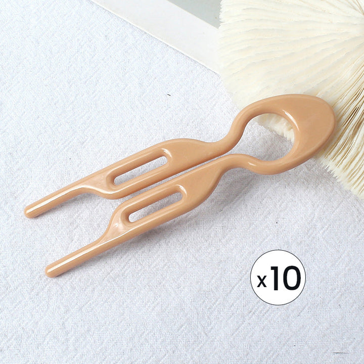 "Elegant fransk hårnål i mångfärgad design för stilfull hårstyling; perfekt damaccessoar för alla tillfällen."