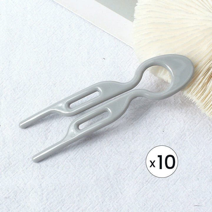 "Elegant fransk hårnål i mångfärgad design för stilfull hårstyling; perfekt damaccessoar för alla tillfällen."