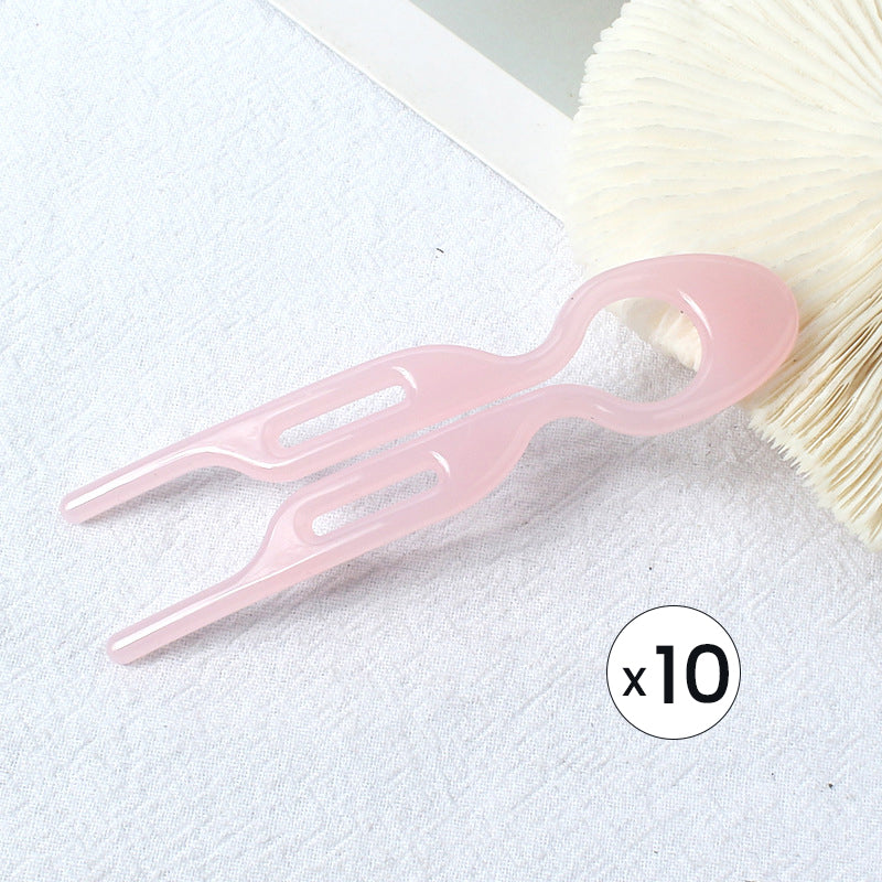 "Elegant fransk hårnål i mångfärgad design för stilfull hårstyling; perfekt damaccessoar för alla tillfällen."