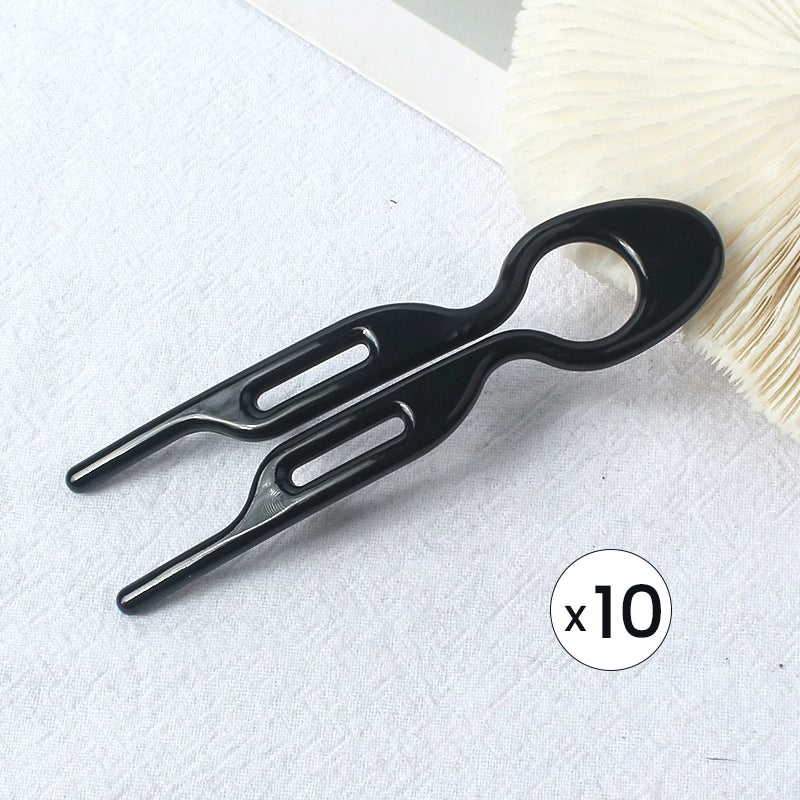 "Elegant fransk hårnål i mångfärgad design för stilfull hårstyling; perfekt damaccessoar för alla tillfällen."