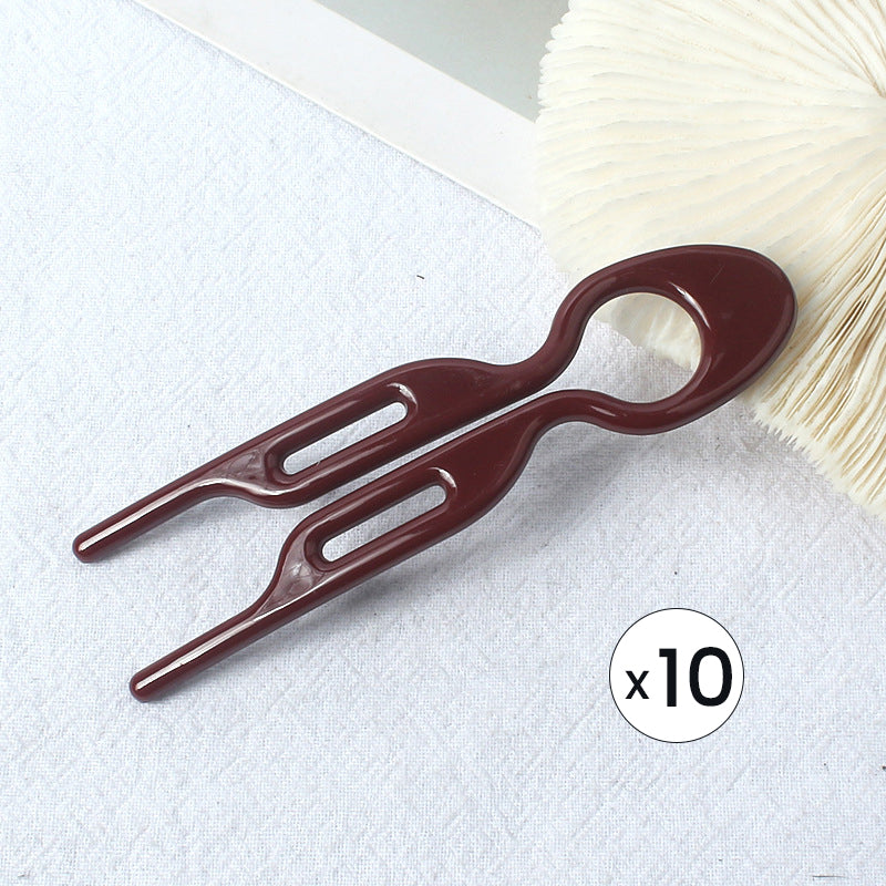 "Elegant fransk hårnål i mångfärgad design för stilfull hårstyling; perfekt damaccessoar för alla tillfällen."