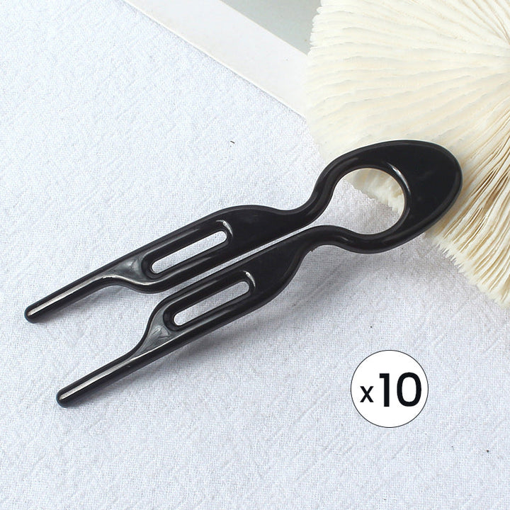 "Elegant fransk hårnål i mångfärgad design för stilfull hårstyling; perfekt damaccessoar för alla tillfällen."