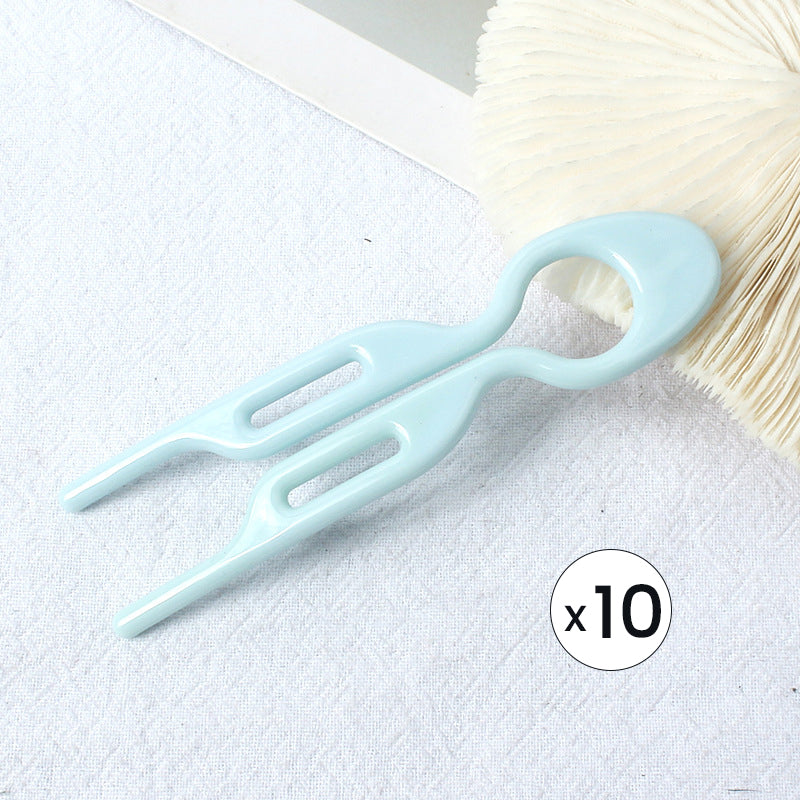 "Elegant fransk hårnål i mångfärgad design för stilfull hårstyling; perfekt damaccessoar för alla tillfällen."