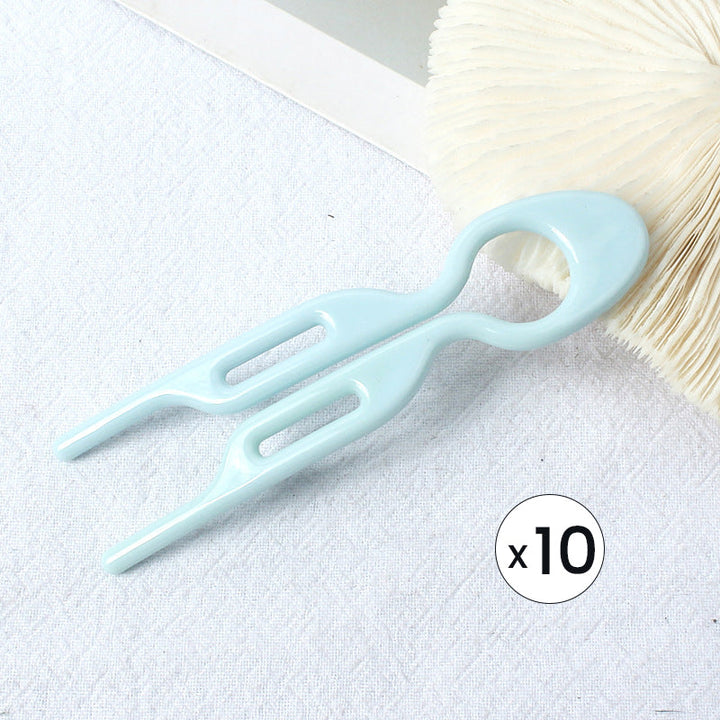 "Elegant fransk hårnål i mångfärgad design för stilfull hårstyling; perfekt damaccessoar för alla tillfällen."