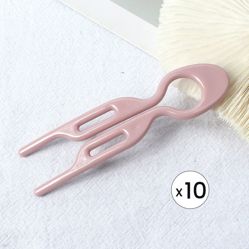 "Elegant fransk hårnål i mångfärgad design för stilfull hårstyling; perfekt damaccessoar för alla tillfällen."