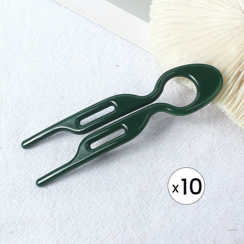 "Elegant fransk hårnål i mångfärgad design för stilfull hårstyling; perfekt damaccessoar för alla tillfällen."