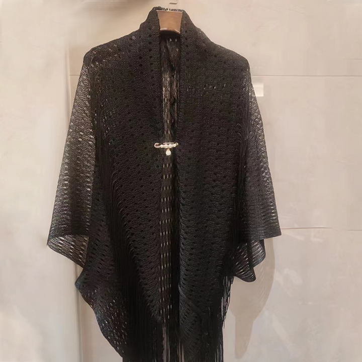 "Elegant franssjal för dam, guld med solskydd. Polyester för komfort och stil. Perfekt accessoar för alla tillfällen."