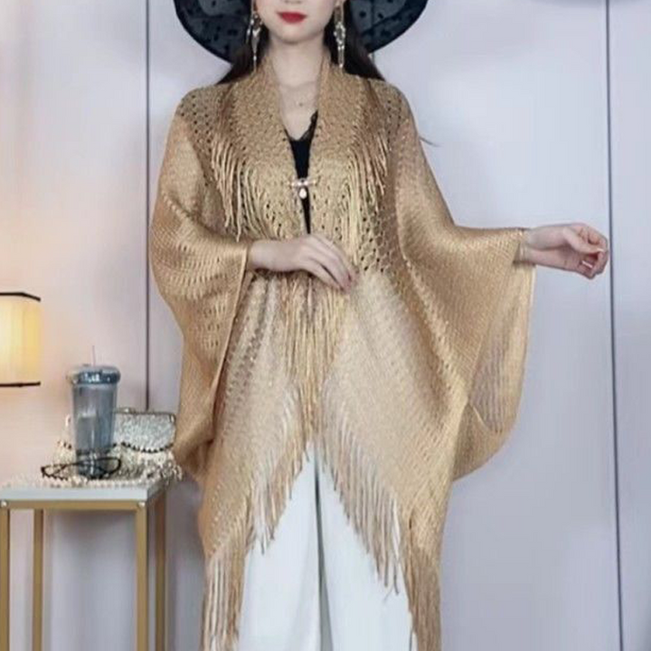 "Elegant franssjal för dam, guld med solskydd. Polyester för komfort och stil. Perfekt accessoar för alla tillfällen."