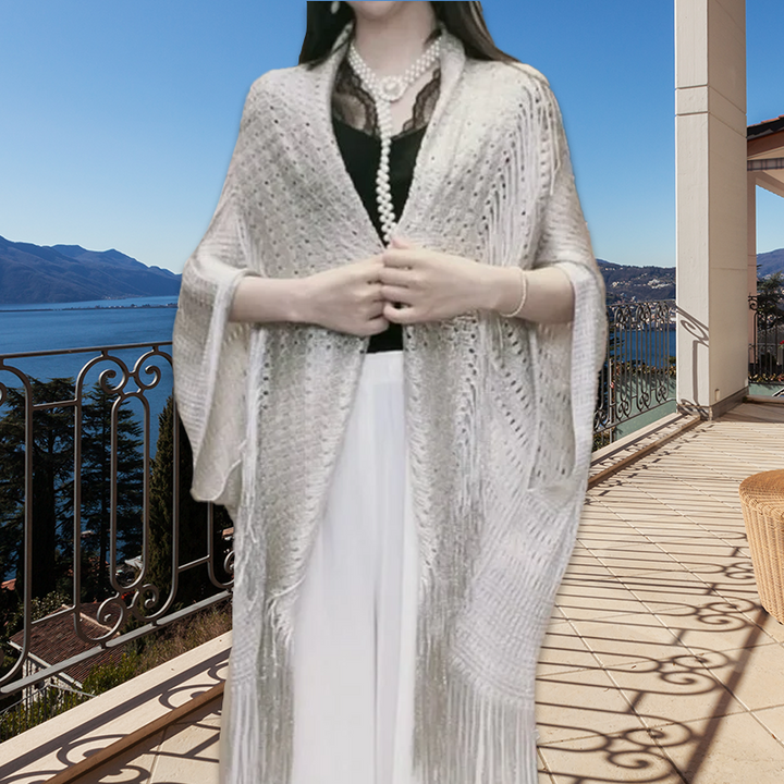 "Elegant franssjal för dam, guld med solskydd. Polyester för komfort och stil. Perfekt accessoar för alla tillfällen."