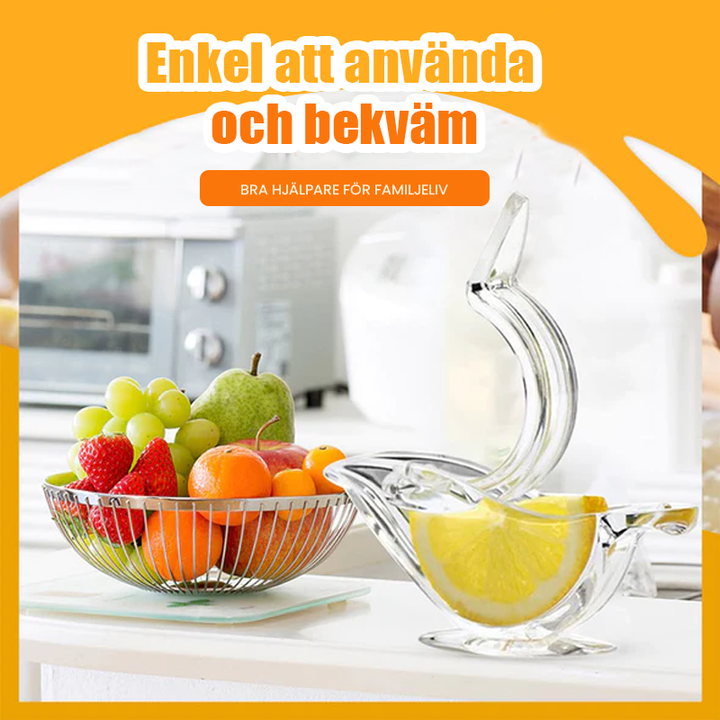 "Elegant genomskinlig manuell citronpress i fågelform, perfekt för köket, ergonomisk och lätt att rengöra."
