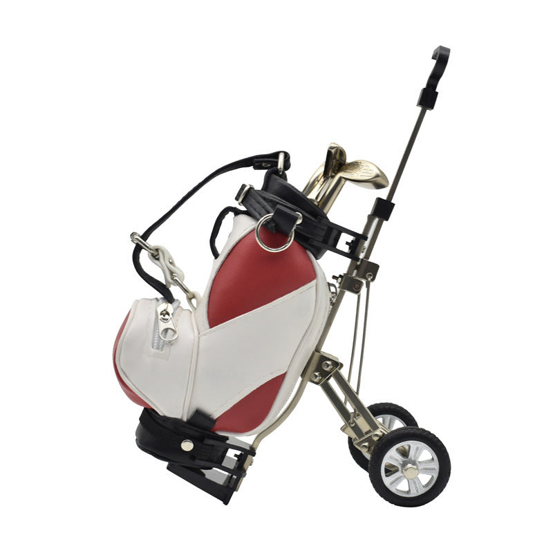 "Elegant golf pennhållare i form av golfväska, i PU och aluminium, flera färger för herr/dam, perfekt för kontor och hem."