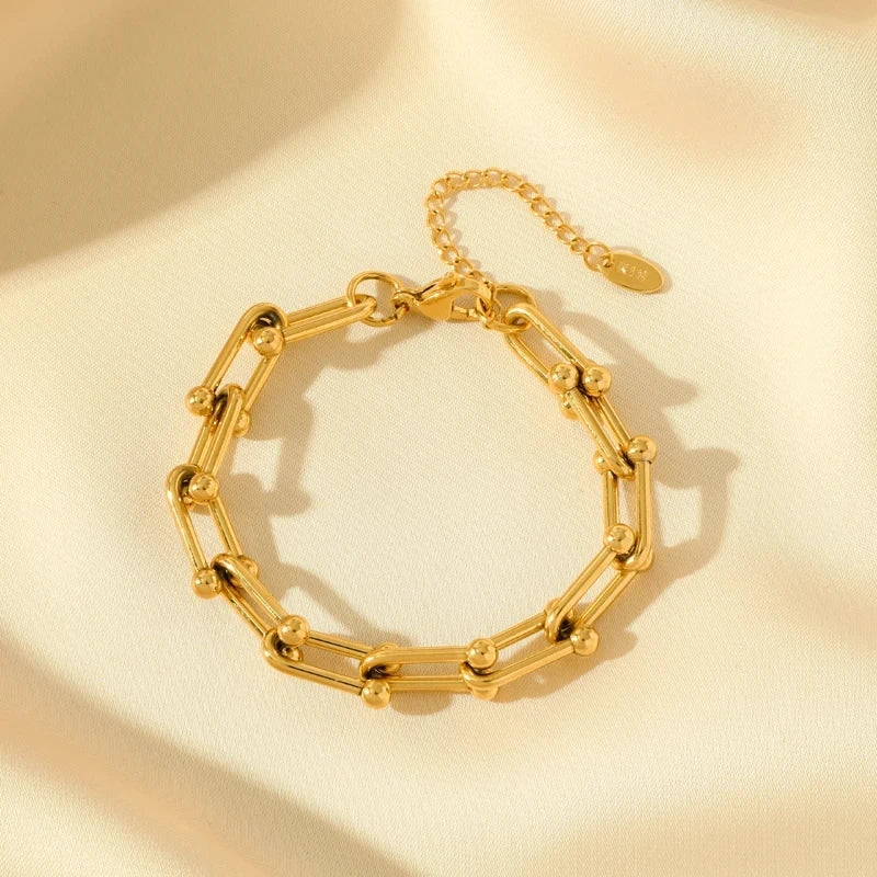 Tidlöst guld länkset för kvinnor, perfekt accessoar för elegans och stil. En presentidé.