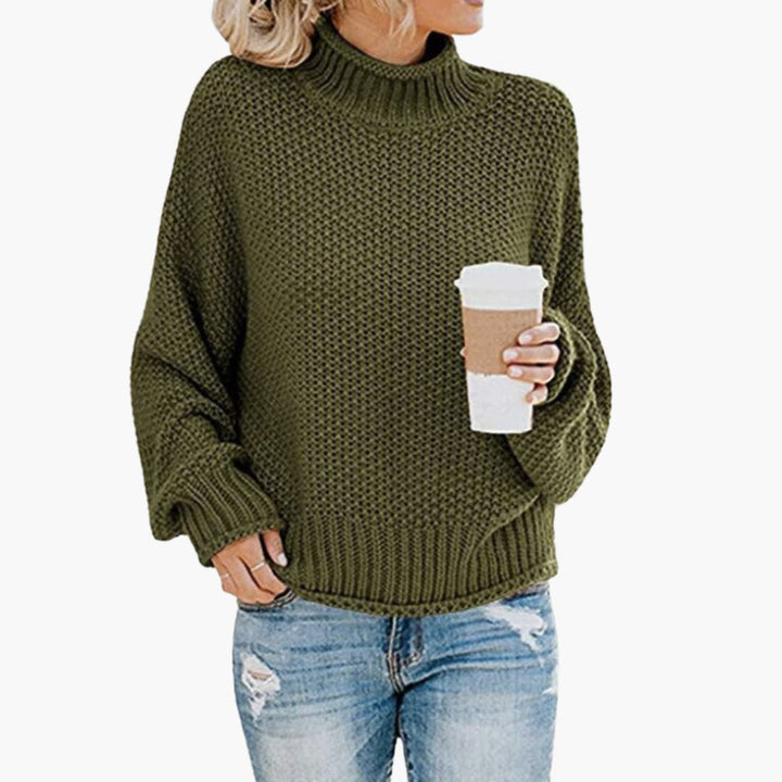 Trendig höghalsad pullover damtröja. Långärmad och stickad, idealisk för vintermode.