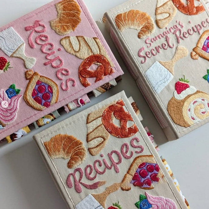 Receptjournal med praktiskt bokmärke. Håll enkelt koll på dina favoritrecept och matlagningsanteckningar.