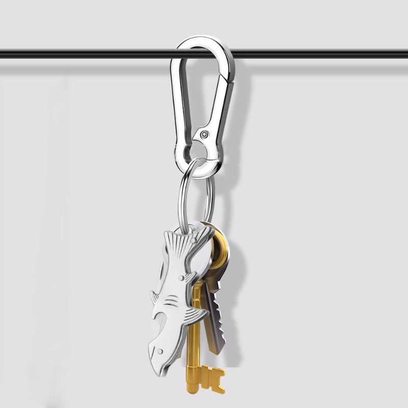 "Elegant, hopfällbar nyckelring i rostfritt stål för mångsidig användning. Perfekt tillbehör i guld, flerfärgad eller silver.