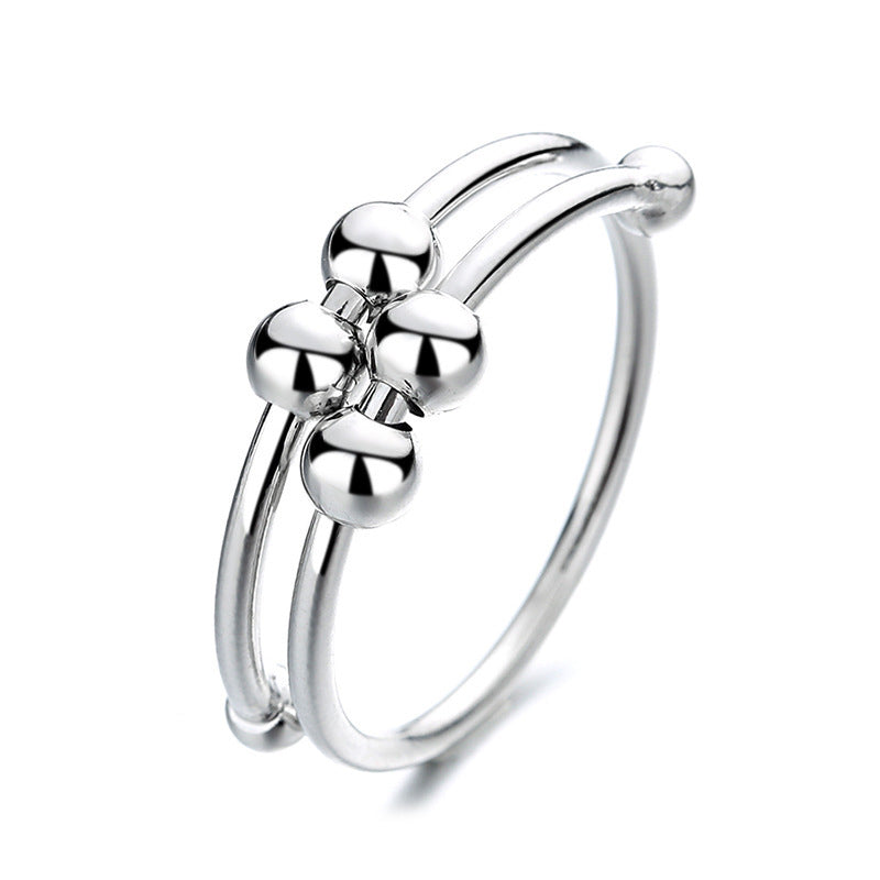 "Elegant justerbar ångestring med 4 roterbara metallpärlor för mindfulness och stresslindring, perfekt för kvinnors accessoar