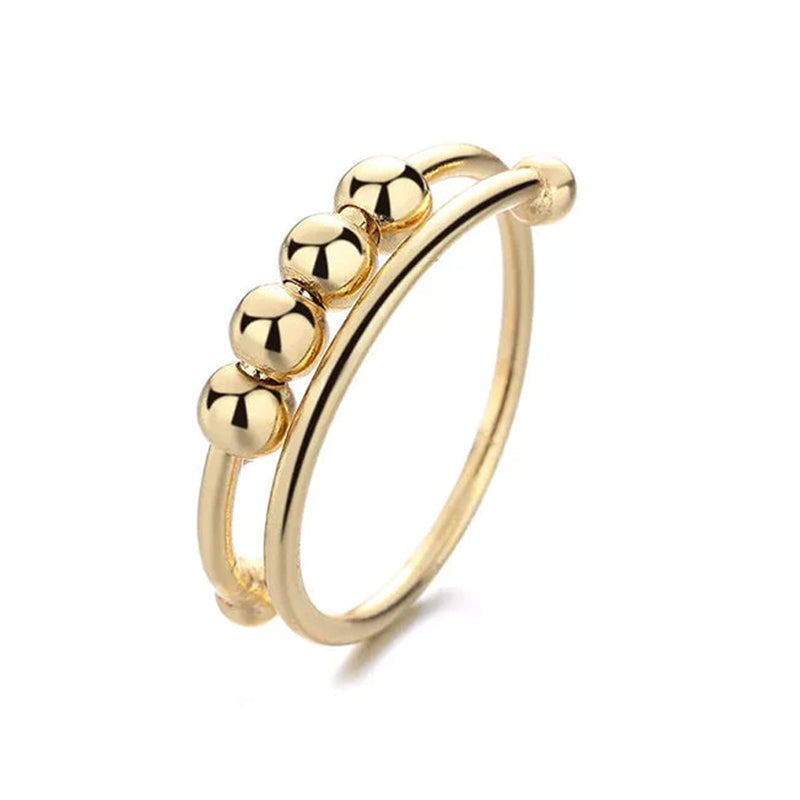 "Elegant justerbar ångestring med 4 roterbara metallpärlor för mindfulness och stresslindring, perfekt för kvinnors accessoar