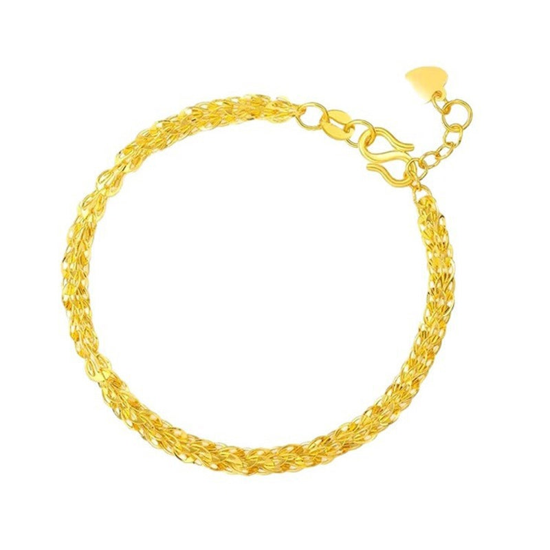"Elegant justerbart Phoenix armband i guld/silver med unikt fjädermotiv, perfekt kvinnligt smycke för alla tillfällen."