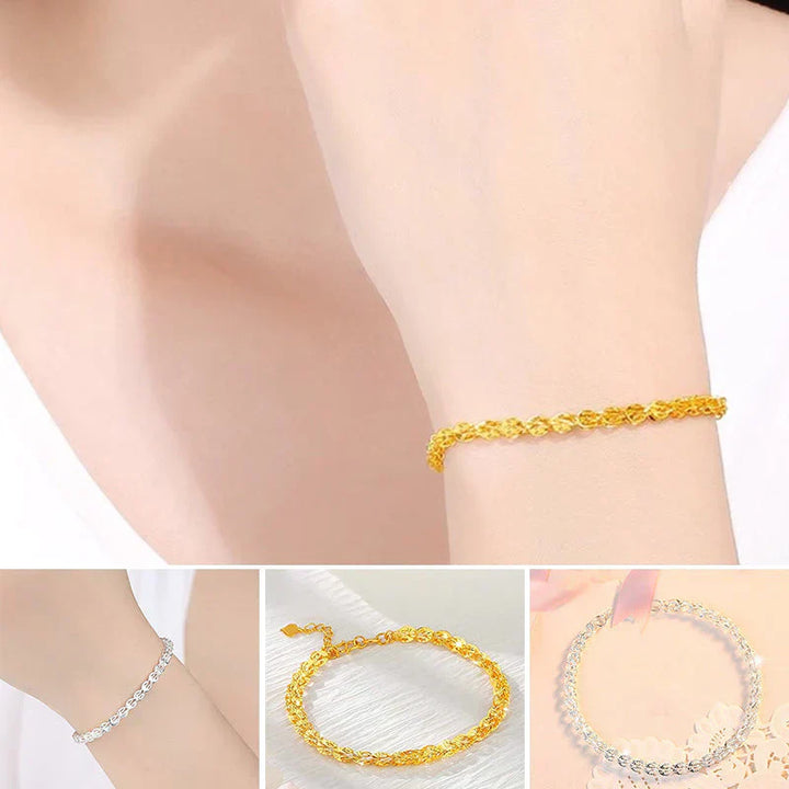 "Elegant justerbart Phoenix armband i guld/silver med unikt fjädermotiv, perfekt kvinnligt smycke för alla tillfällen."