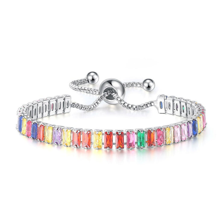 "Elegant justerbart zirkonarmband i rosguld/silver med glidspänne, flerfärgade zirkoner och boxkedja."