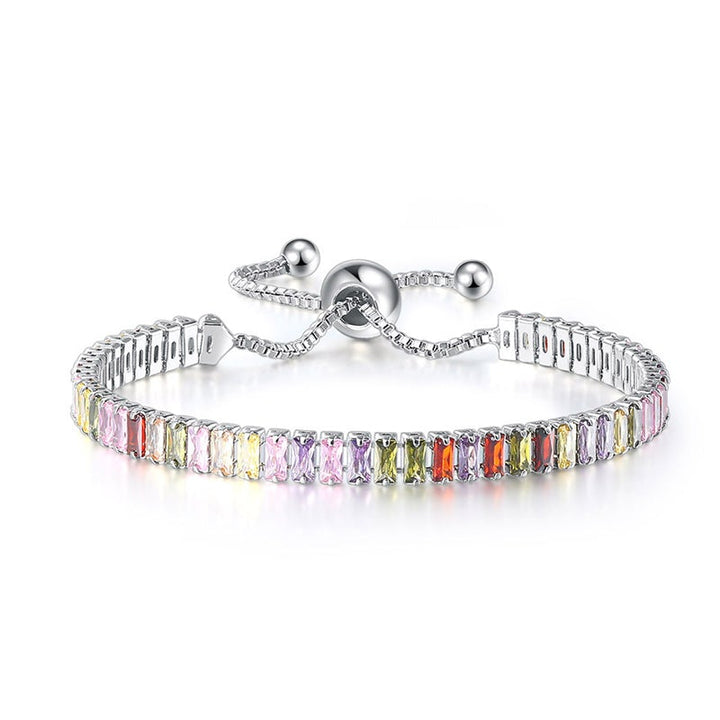 "Elegant justerbart zirkonarmband i rosguld/silver med glidspänne, flerfärgade zirkoner och boxkedja."