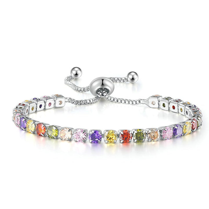 "Elegant justerbart zirkonarmband i rosguld/silver med glidspänne, flerfärgade zirkoner och boxkedja."