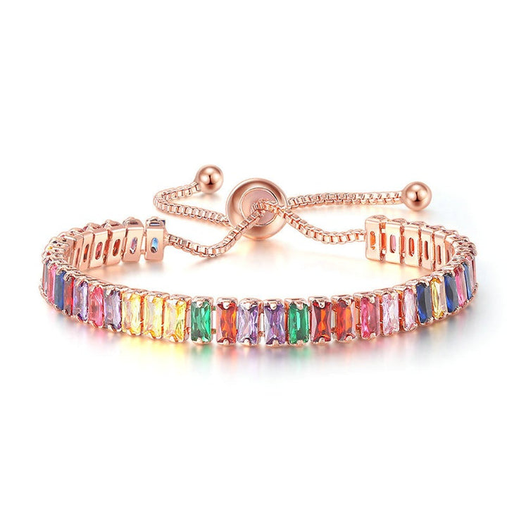 "Elegant justerbart zirkonarmband i rosguld/silver med glidspänne, flerfärgade zirkoner och boxkedja."